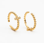 Birdie cross ring
