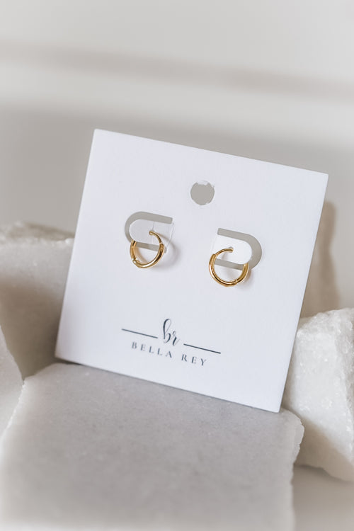 The Nia dainty huggie hoop earrings