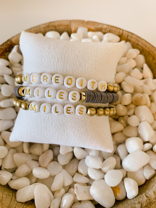 Personalized bracelet (gray Heishi beads with white & gold letters)